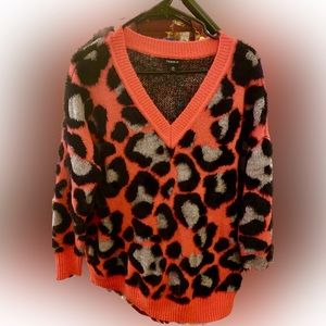 Torrid pink/coral leopard sweater . V neck soft and fuzzy size 00(12/14) NWOT